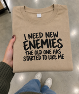 I Need New Enemies The Old Ones Have Started to Like Me T-Shirt